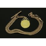 A 9ct gold curb link double Albert chain, with 9ct gold T-bar and George III spade guinea with