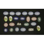 A large quantity of oval and circular Wedgwood Jasperware cameo plaques, to include various