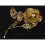 A gold single pearl floral brooch, marked 18k, 14.54g