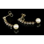 A pair of diamond and cultured pearl drop earrings, with a series of old European cut diamonds, each