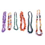 A collection of gemstone beads, to include a single row of graduated malachite beads, a single row