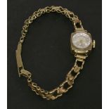 A ladies 9ct gold Avia mechanical watch with textured case, and later 9ct gold fancy link strap,