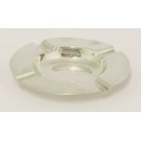 A George V silver ashtray,Birmingham 1928,of typical form, plain, maker's mark rubbed,12cm diameter,