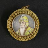 An Indian portrait miniature on ivory,mid-19th century, Ranjit Singh, mounted in a contemporary high
