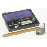 A case planimeter,by Dennert & Pape, Hamburg, an Otis King Model-K calculator,boxed,a folding 24in