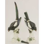 A pair of Meissen magpies,19th/20th century, crossed swords marks and incised '62a',54cm high (2)