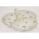 A Meissen porcelain sectional nut dish,20th century, with looped handle, decorated with floral