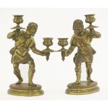 A pair of gilt bronze twin-branch candelabra,late 19th century, each modelled as a servant holding
