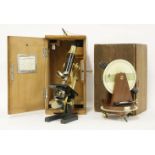 A Casella student's theodolite,with instructions and pine box,24cm high,an R Winkel brass and