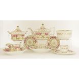 A porcelain part tea service, early 19th century, probably Derby, decorated with bands of roses