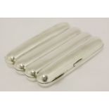 An Edward VII silver cigar case,Hilliard & Thomason, Birmingham 1905,shaped rectangular for four