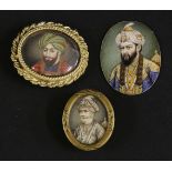 Three Indian oval portrait miniatures on ivory,mid-19th century, representing Sikh leaders, one