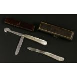 An early 20th century silver and mother-of-pearl handled folding fruit knife and orange peeler,