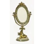 A French alabaster and champlevé mirror,the bevelled edge, oval mirror surmounted with female
