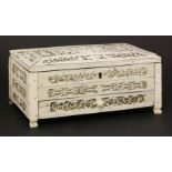 A Napoleonic prisoner of war bone workbox, the panels pierced and foil-backed with figures,