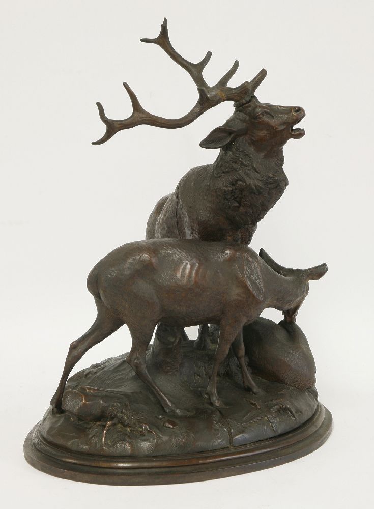 A Black Forest carved deer group, 19th century, the stag with two hinds on a domed base with rocks - Image 2 of 3