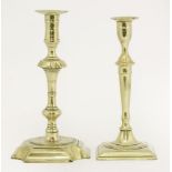 Two brass candlesticks,mid-18th century, 26.5 and 25.5cm high (2)