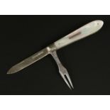 An early 20th century silver and mother-of-pearl handled folding knife and fork,maker's mark HW Ld.,