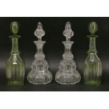 A pair of Webb cut glass decanters, anda pair of green glass decanters, 19th century, 34cm high (4)