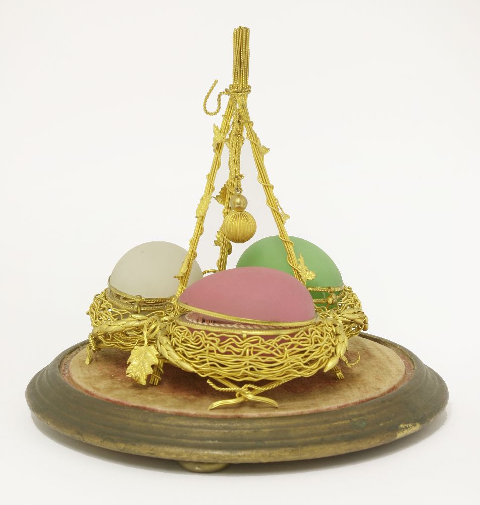 A Regency Palais Royal étui,c.1820-1830, in the form of a trio of opaline pâte de riz glass eggs, in