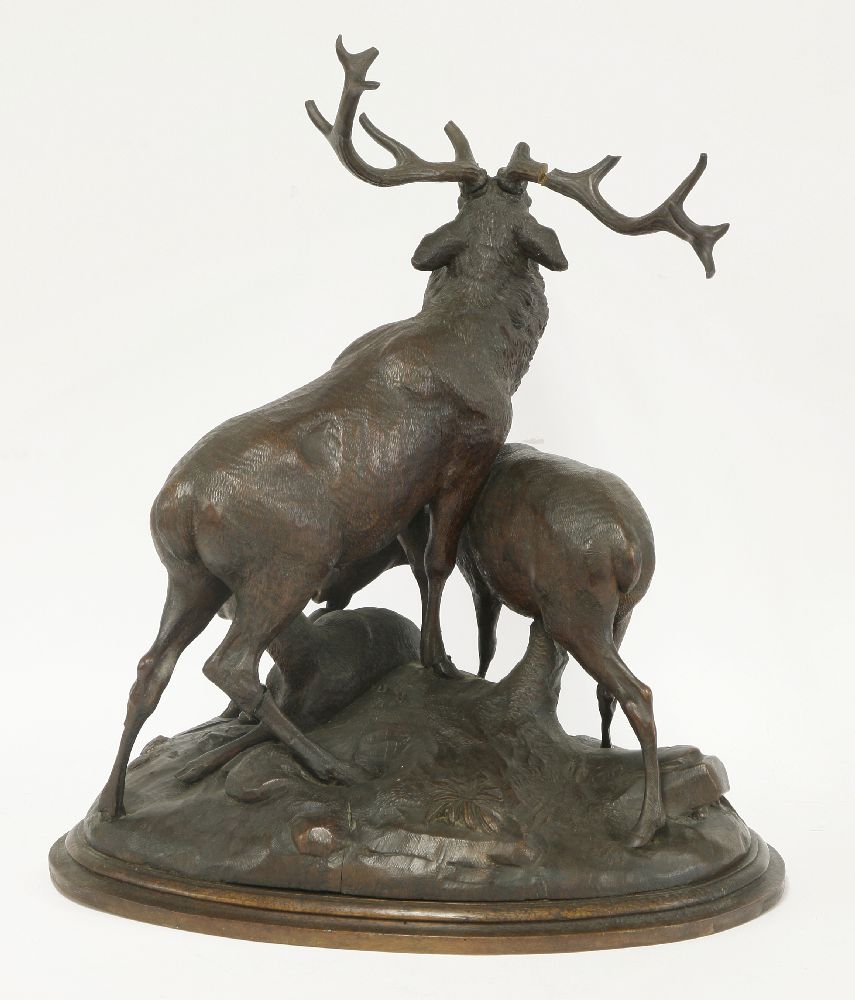 A Black Forest carved deer group, 19th century, the stag with two hinds on a domed base with rocks - Image 3 of 3