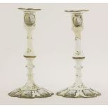 A pair of Battersea enamel candlesticks, 18th century, of silver shape, with detachable sconces,