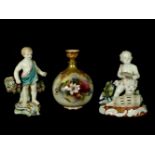 A Royal Worcester bottle vase, painted with roses, 12.5cm; a Chelsea/Derby type figure and another