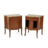 A pair of parquetry marble tables, each with a drawer, and a cupboard or two drawers and shelves,