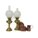 A collection of oil lamps and copper wares, etc.