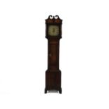 An oak and mahogany cased 30 hour long case clock, with a painted dial, with calendar aperture,