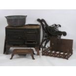 A French cast iron 'Beetonette' stove, together with a wrought iron fire grate, and a pair of