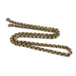 A gold faceted belcher chain, fitting not gold, tested as approximately 9ct, 11.66g