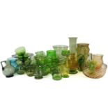 A collection of mixed green glass ware