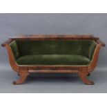 A 19th century mahogany scroll end sofa