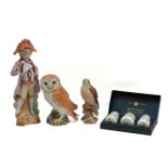 A Beswick owl and a Kestrel, a Continental figure of a standing boy, and a three piece Minton '
