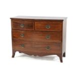A George III mahogany bow front chest of two short above two long drawers, on swept feet, 107cm