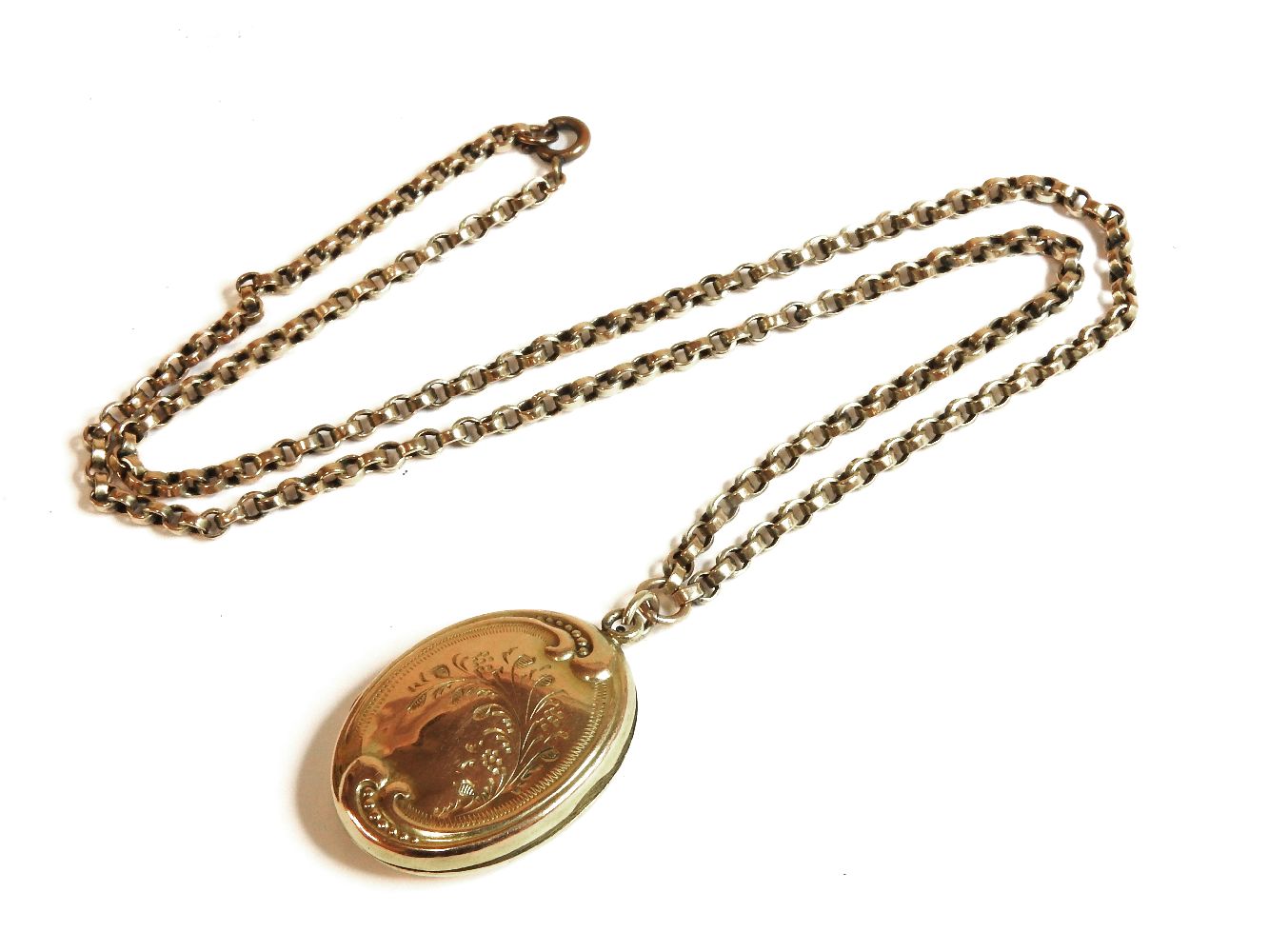 A back and front oval locket on gold belcher chain, tested as 9ct