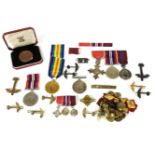 A WWI Victory medal and general war medal, awarded to Lt J M Davies, a collection of WWII medals,