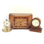 An Art Deco walnut cased mantel clock, a small walnut cased mantel clock and an anniversary clock (