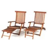 Two teak liner chairs