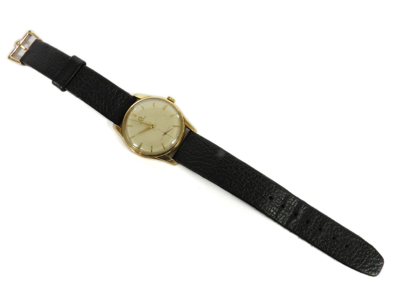 A 9ct gold gentleman's Omega mechanical strap watch, with cream dial and gilt baton numerals,