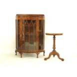 A mid 20th century walnut demi lune display cabinet, together with a late Victorian circular