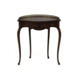 An Edwardian serpentine fronted demi lune occasional table, with galleried top and single drawer