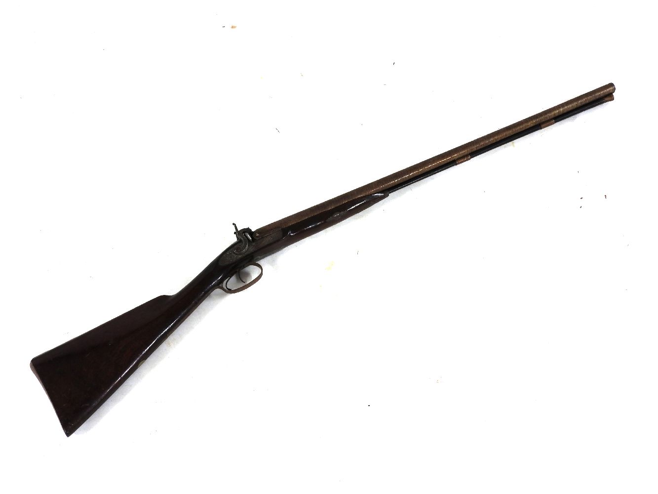 A B Dexter twin barrel shotgun, with mahogany stock and engraved steel plates, the barrel