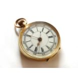 A gold open faced fob watch, white enamel dial with black Roman numerals, inscription to case,