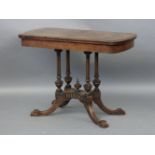 A Victorian burr walnut card table, the incised fold over top encasing baize interior on quadruple