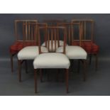 A matched set of six Gordon Russell teak dining chairs, over stuffed upholstered seats