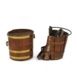 An oak coopered bucket, with loop handles, 33cm high, and another, with a swing handle, damaged