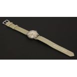 A gentleman's Elgin A-17 WWII US military mechanical strap watch, c.1942, with a circular silvered