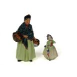 A Royal Doulton figure, HN1953, The Orange Lady, and another